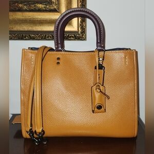 **SOLD**Coach Rogue